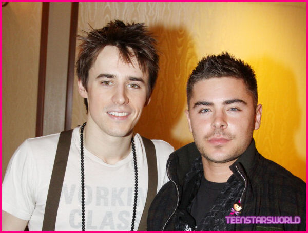 The Lucky One Star Zac Efron Pose backstage with Reeve Carney for a photo 